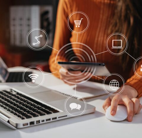 Digital marketing media in virtual icon globe shape business open his hand, working touch screen tablet at home offce.